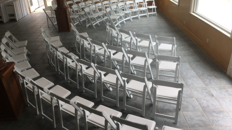 Indoor wedding hall at Mitchell Grove with rows of chairs set up for an intimate ceremony space.