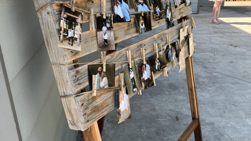 Handmade pallet easel in Mitchell Grove’s lending closet, crafted by a couple and now used for menus, seating charts, and photos at weddings in Humboldt County near Eureka, California.