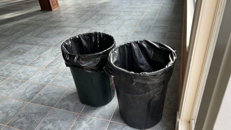 Trash cans standing tall, ready for wedding duty